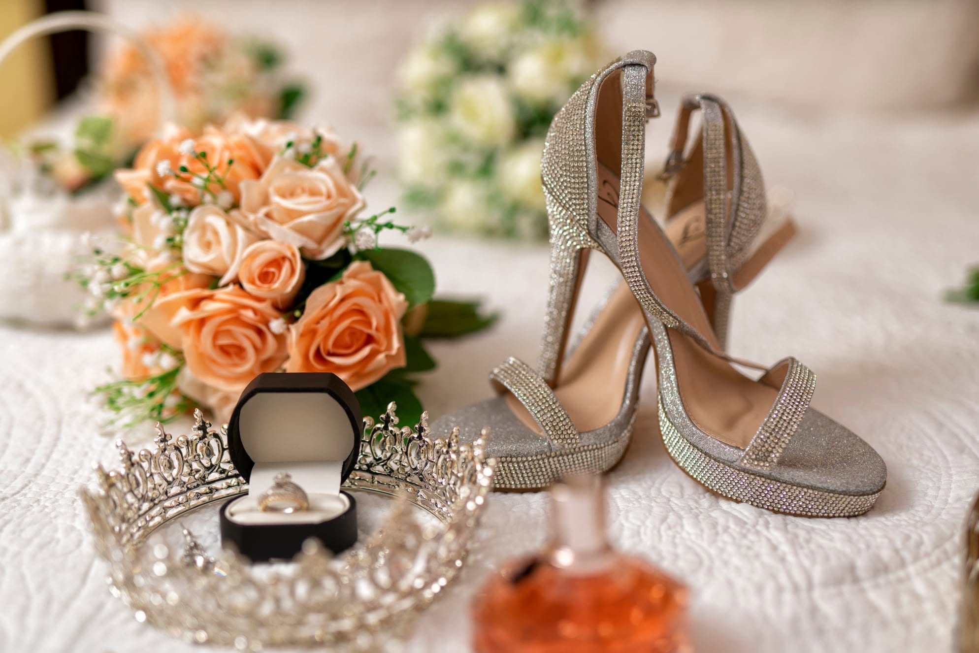 Bridal heels, ring, crown and roses styled together